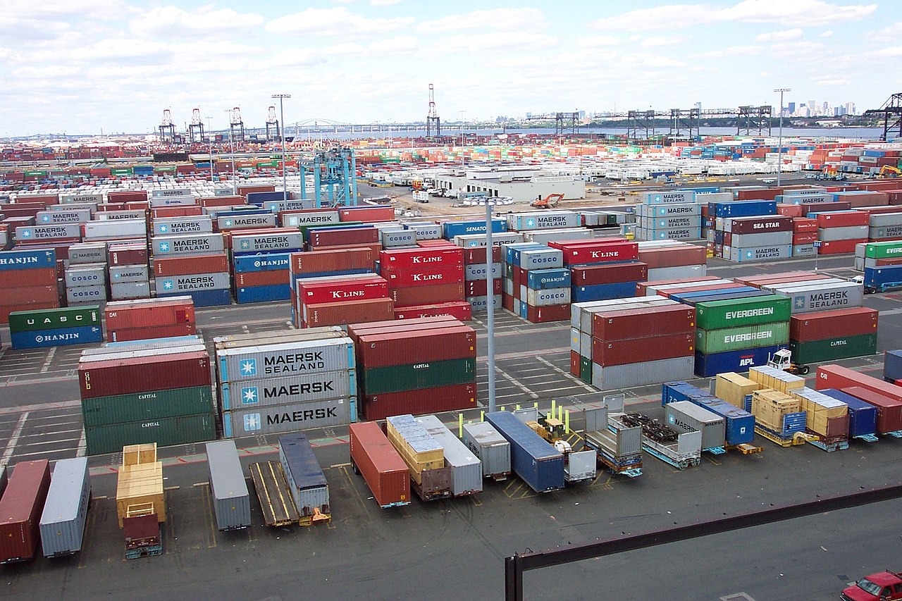 Container port operations with cranes and freight activity